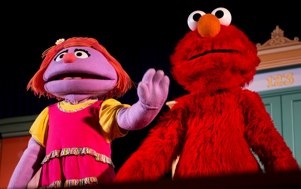 Sesame Street characters sing, dance into hearts of military children