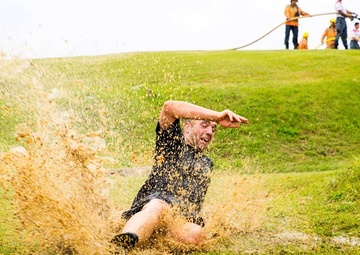 Competitors embrace warrior’s way during mud run