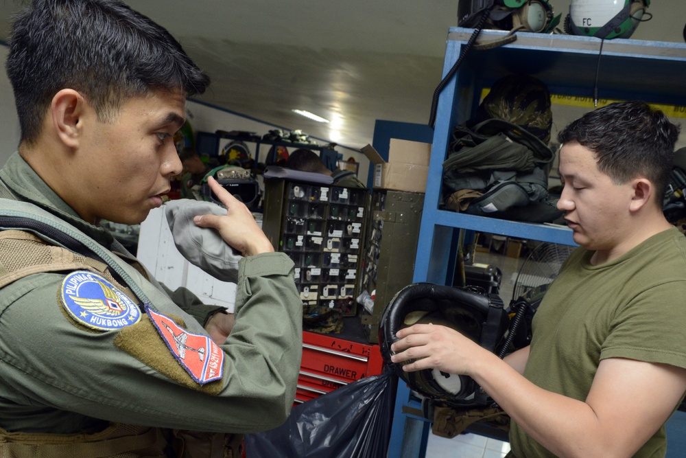 U.S., Philippine fighter pilots take off in an F/A-18 Hornet