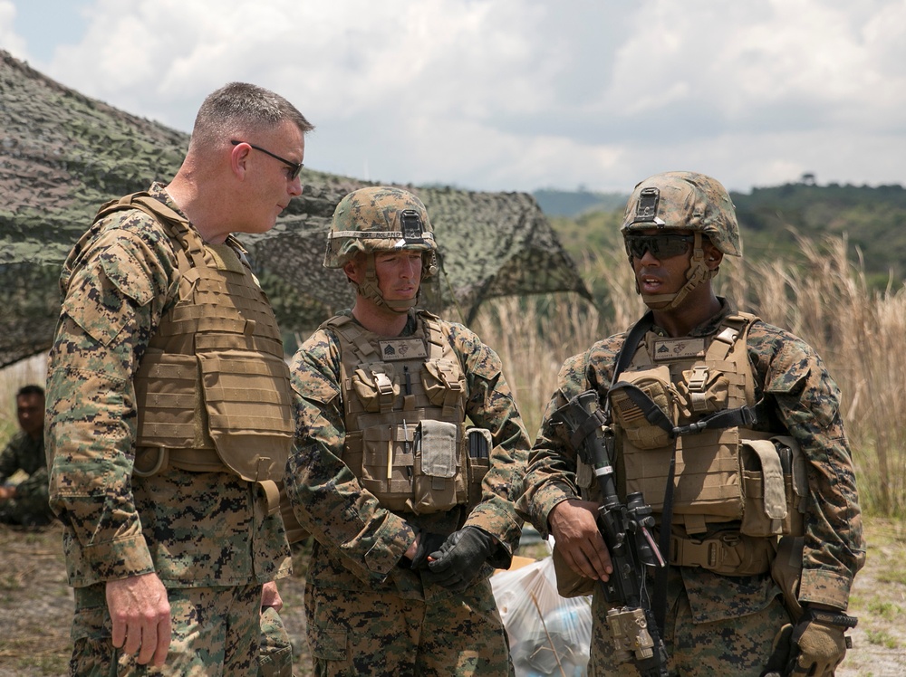U.S. Marines brief Brig. Gen. Niel E. Nelson in the field during Balikatan 2014