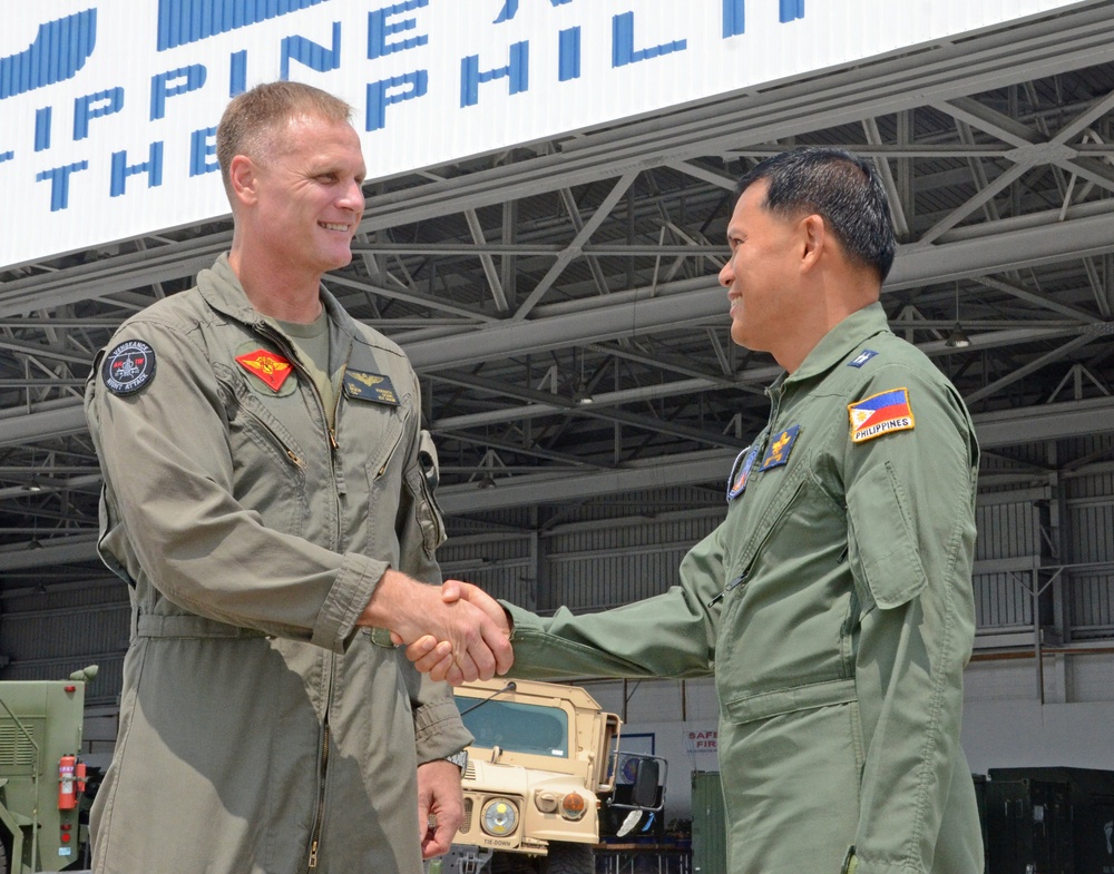 Office call on the flight line with Philippine Air Force Maj. Gen. Sonny Manalo and U.S. Marine Corps Brig. Gen. Steven Rudder