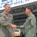 Office call on the flight line with Philippine Air Force Maj. Gen. Sonny Manalo and U.S. Marine Corps Brig. Gen. Steven Rudder