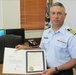 Coast Guard accepts, places on display historical documents
