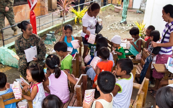 Philippine, U.S. forces provide additional aid to Tacloban after Yolanda disaster