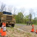 Soldier attempts to place his bumper between the cones