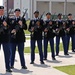 Soldiers stand ready to fire a salute in honor of Spc. Carl A. Lissone