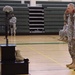 Col. Paul H. Fredenburgh III and Command Sgt. Maj. Darris Curry give their final salute