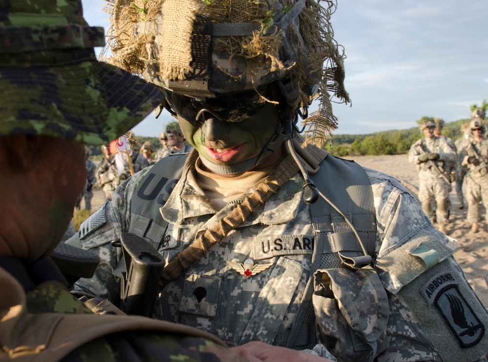 American, Canadian paratroopers jump in to Poland for exercise