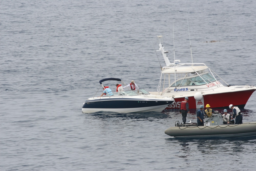 USS Dubuque sailors, Coast Guard help stranded boaters