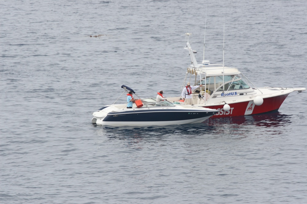 USS Dubuque sailors, Coast Guard help stranded boaters