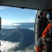 An aviation maintenance technician from Air Station Sitka, performs his duties aboard a Coast Guard MH-60 Jayhawk helicopter