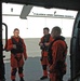 Coast Guard MH-60 Jayhawk helicopter crew prepares for departure from Juneau, Alaska