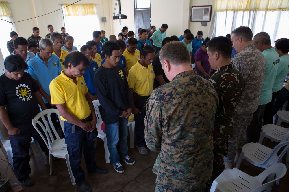 Members of the Armed Forces of the Philippines, Australian Army, and U.S. service members conduct a cooperative health engagement in Rawis province, Philippines