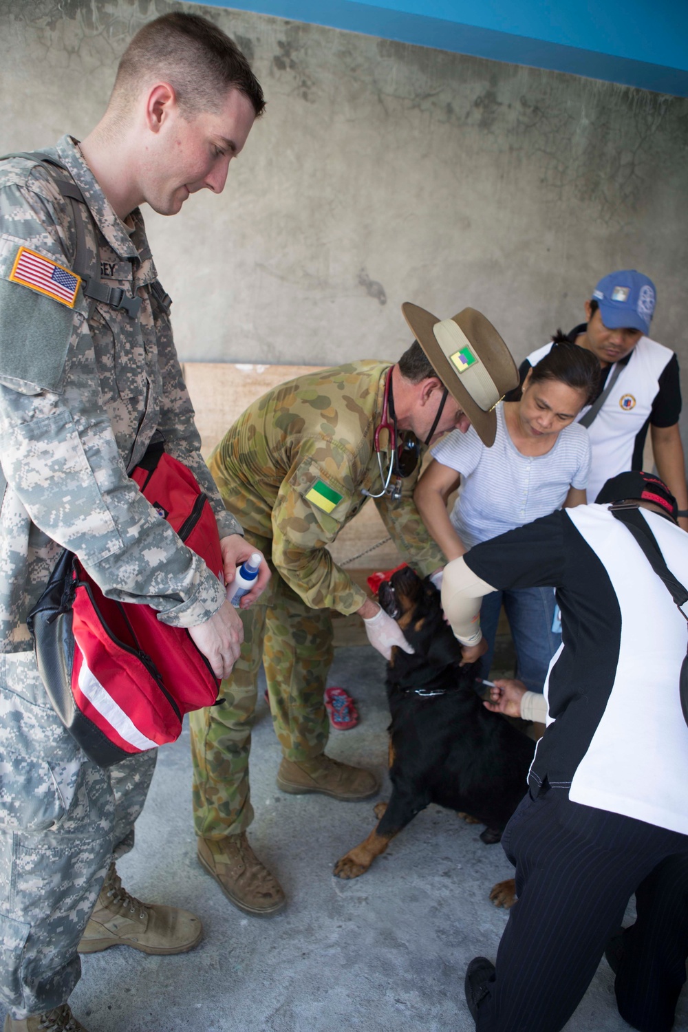 Members of the Armed Forces of the Philippines, Australian Army, and U.S. service members conduct a cooperative health engagement in Rawis province, Philippines