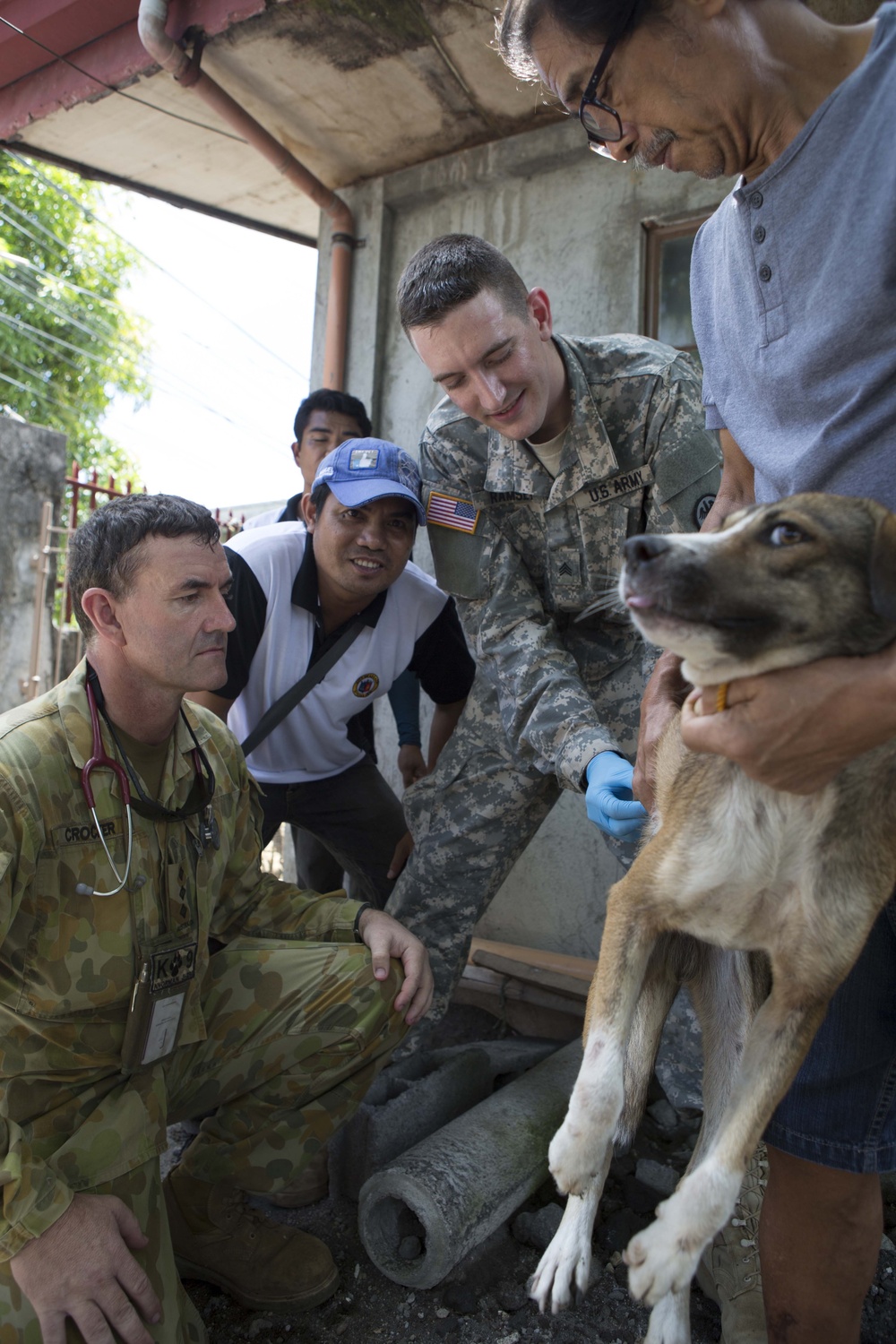 Members of the Armed Forces of the Philippines, Australian Army, and U.S. service members conduct a cooperative health engagement in Rawis province, Philippines