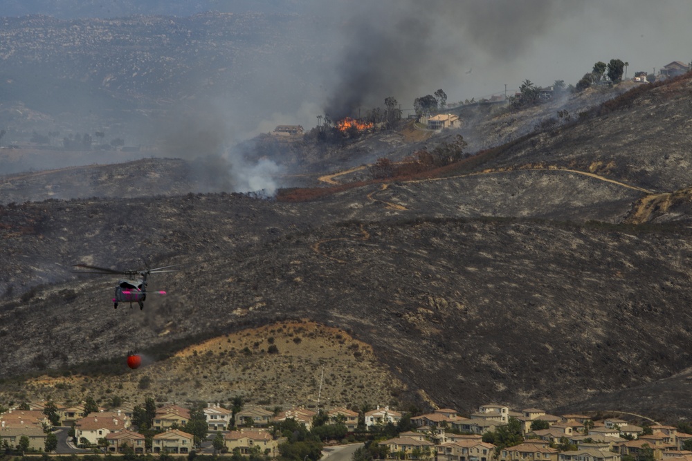 Marines help state emergency personnel fight Cocos fire in southern California