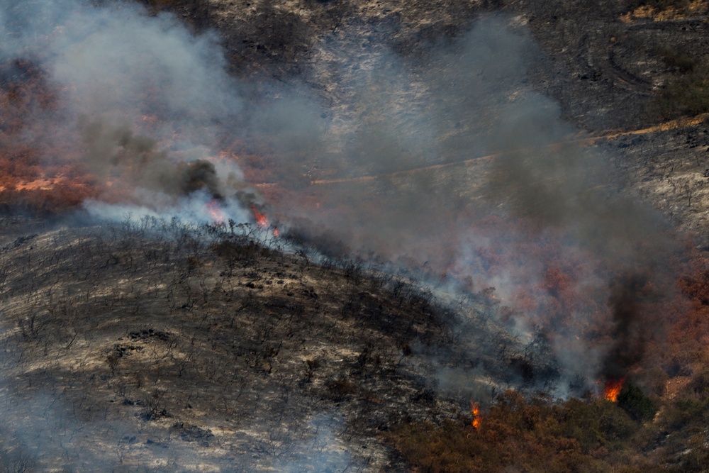 Marines help state emergency personnel fight Cocos fire in southern California