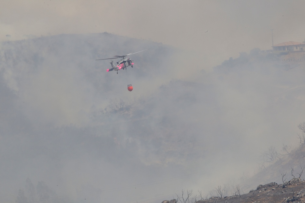 Marines help state emergency personnel fight Cocos fire in southern California