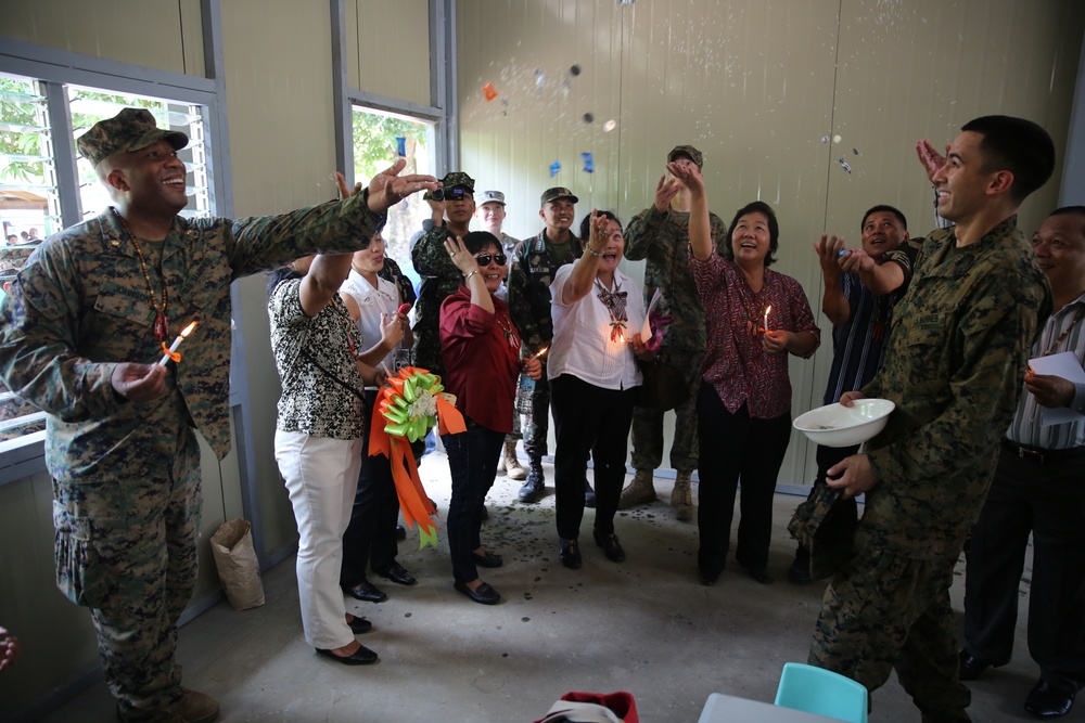 AFP, U.S. armed forces celebrate finished renovations with community members