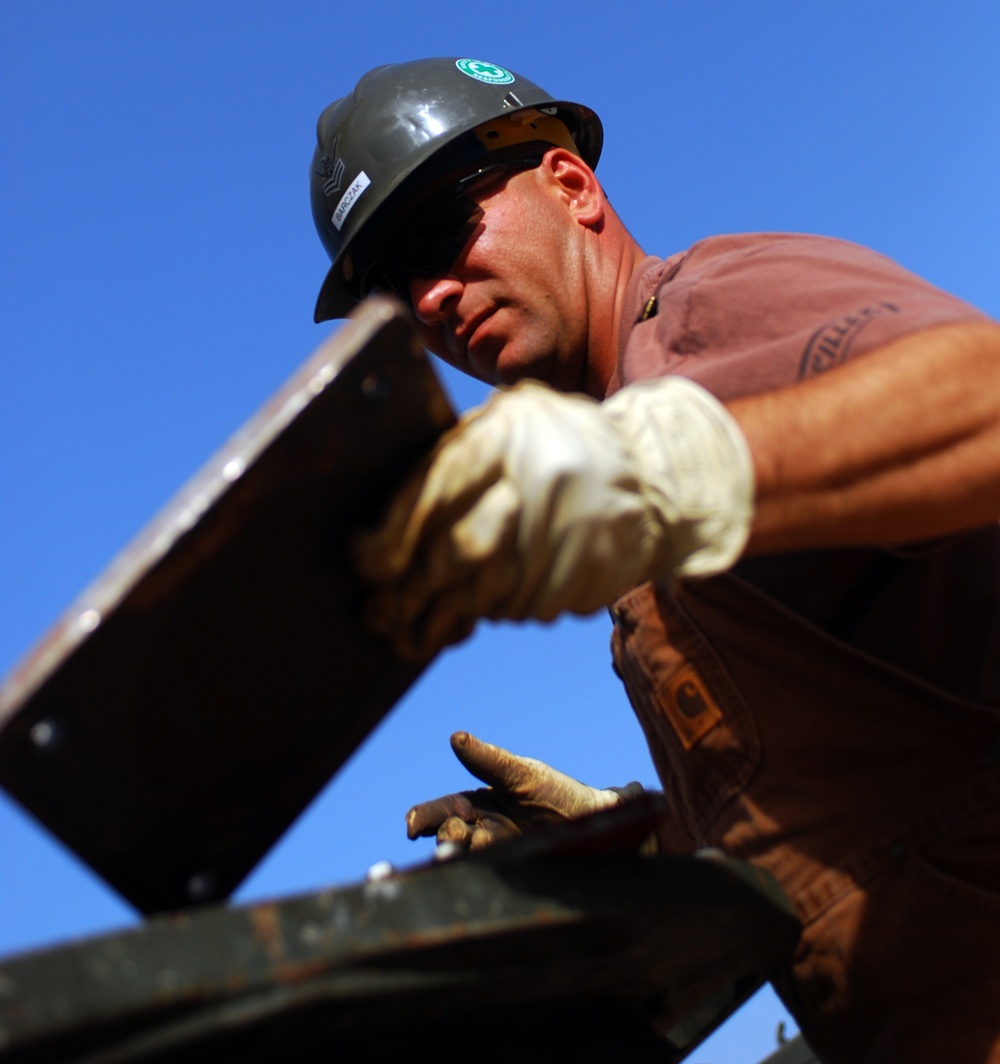 Naval Mobile Construction Battalion 74 fixes water wells