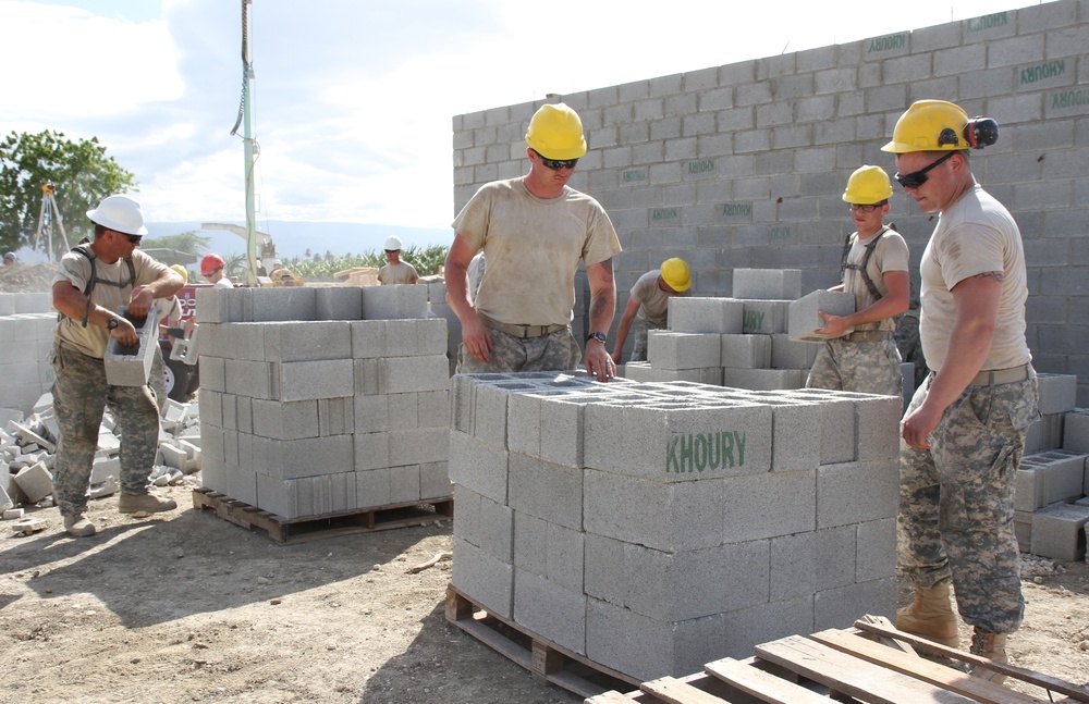 Engineers lay final concrete block