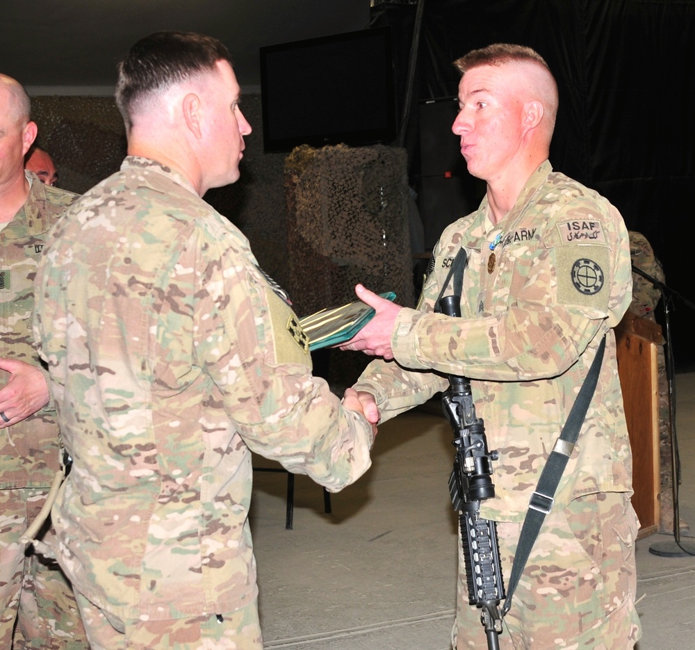 Sgt. Adam Schoen receives the Army Achievement Medal