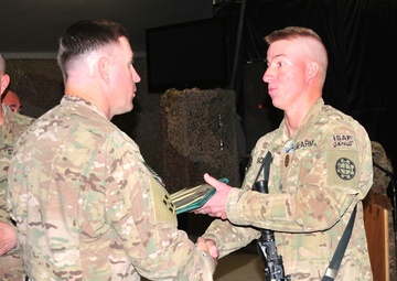 Sgt. Adam Schoen receives the Army Achievement Medal