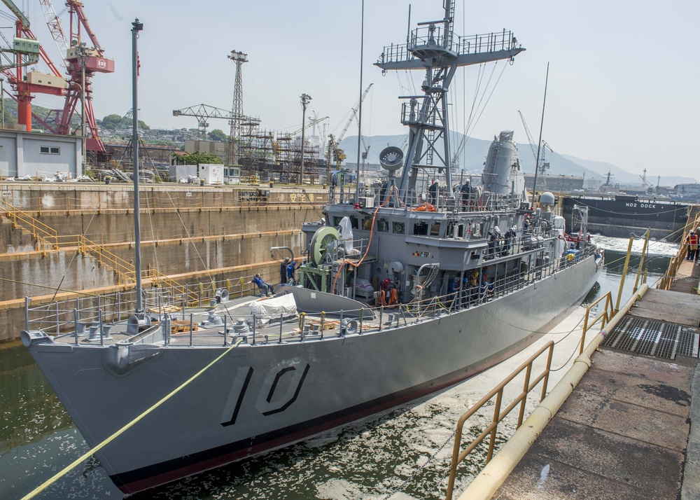 USS Warrior departs Sasebo