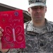 Capt. Northrop displays the card of support