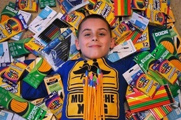 Matthew Northrop surrounds himself with donations