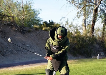 Guard volunteers take a swing at charity