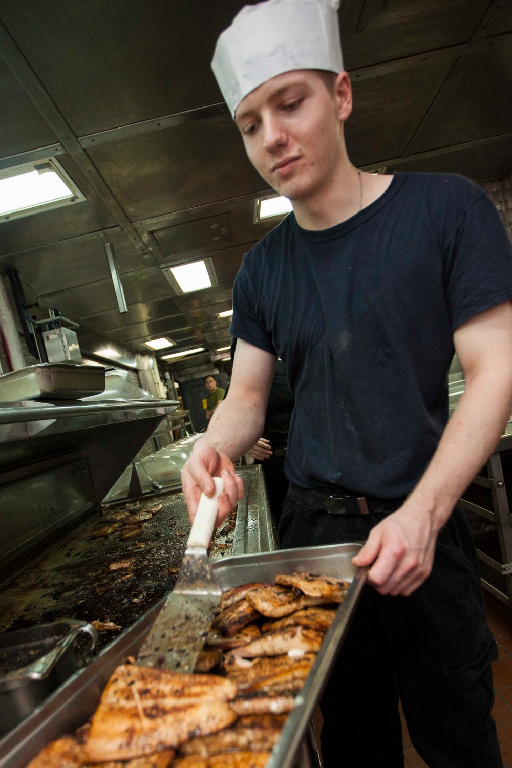 Marines, Sailors prepare chow for USS Bataan