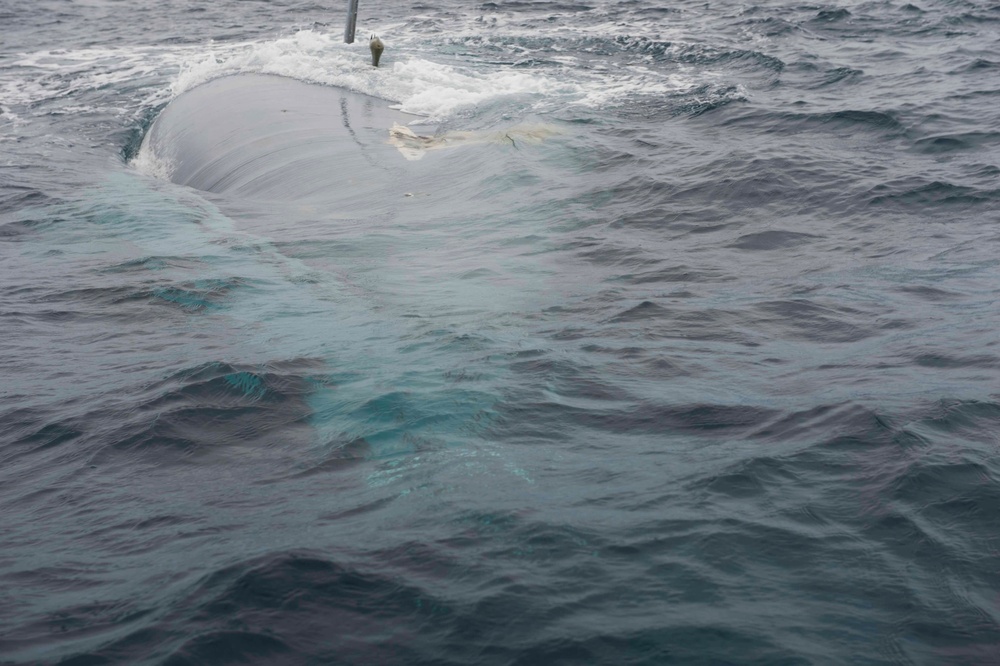 Overturned hull of the Cheeki Rafiki