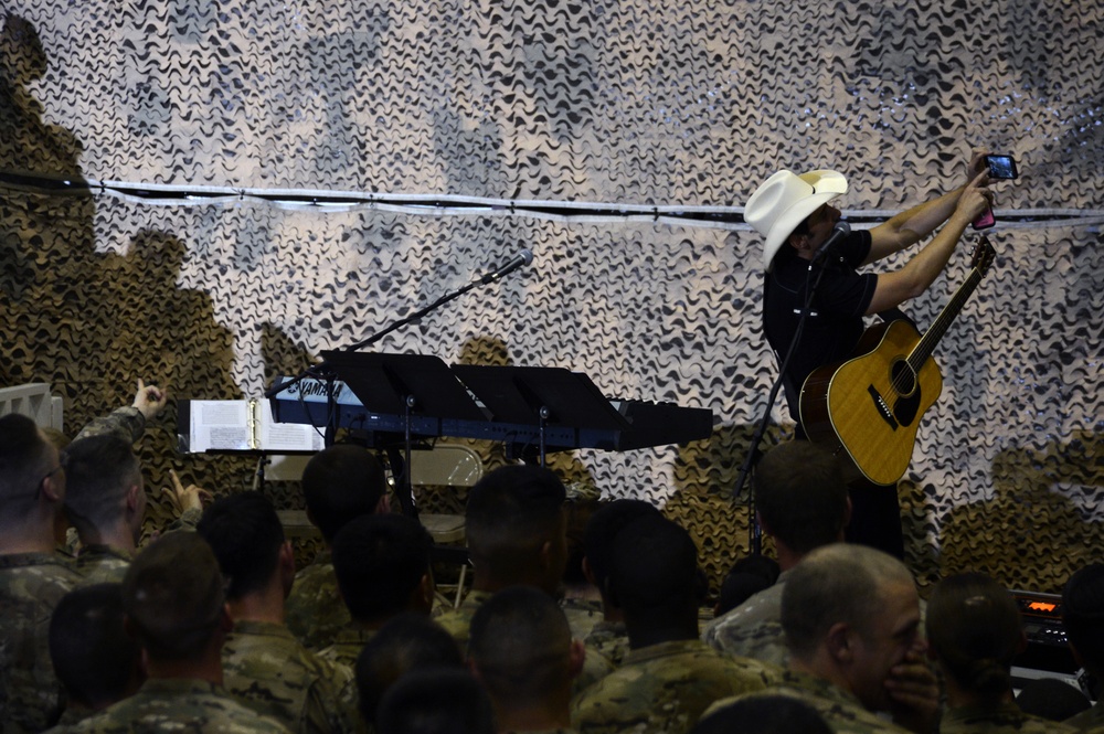 President Barack Obama and country singer Brad Paisley make a surprise visit to Afghanistan