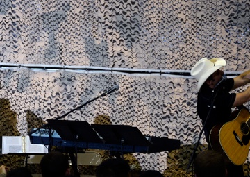 President Barack Obama and country singer Brad Paisley make a surprise visit to Afghanistan