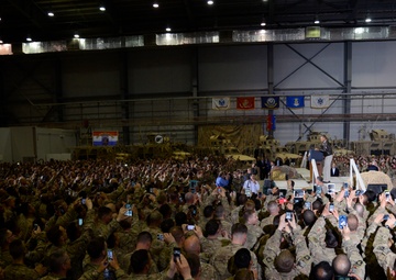 President Barack Obama and country singer Brad Paisley make a surprise visit to Afghanistan