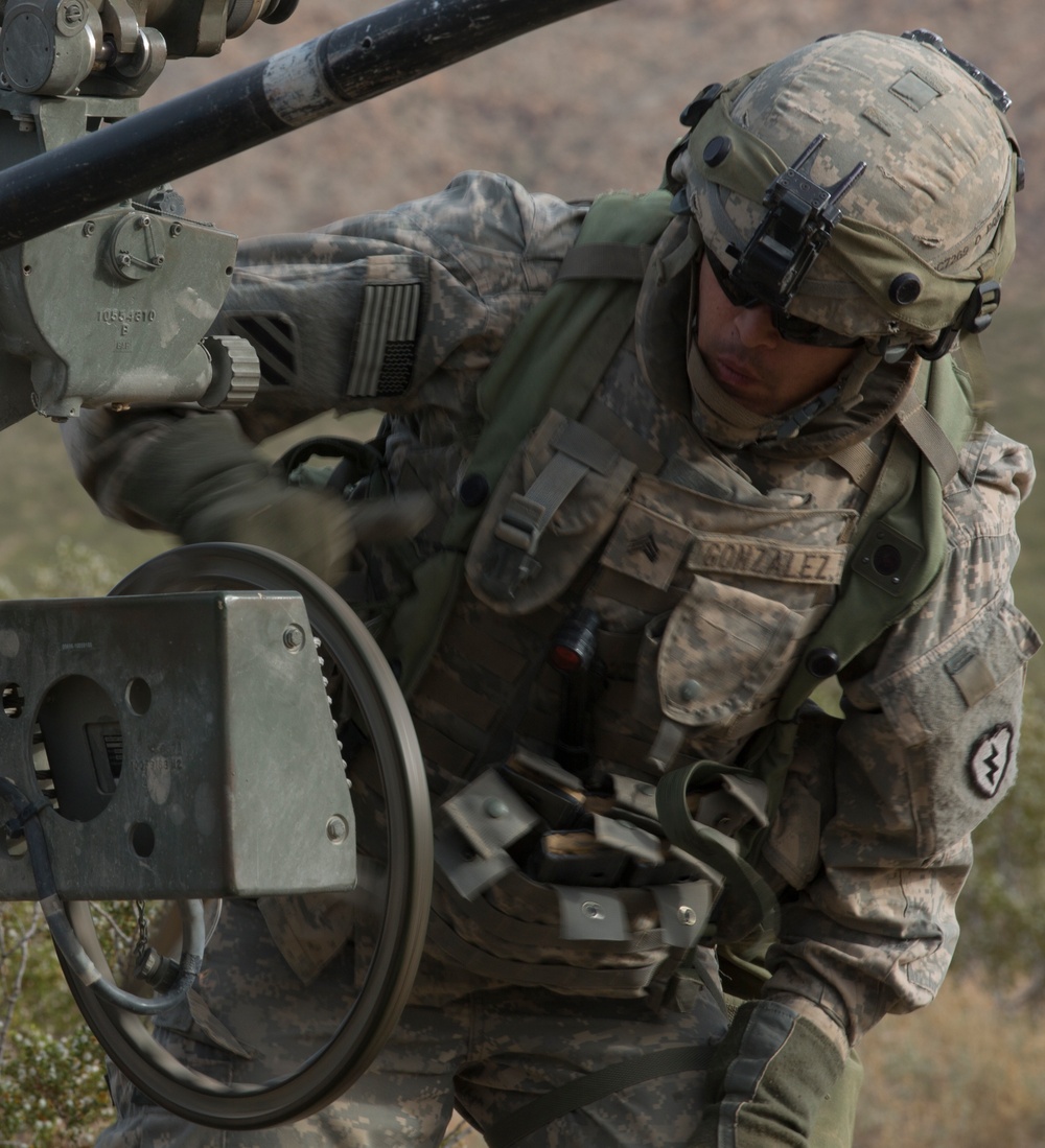 Soldiers engage enemy targets with howitzer