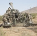 Soldiers engage enemy targets with howitzer