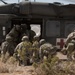 Soldiers engage enemy targets with howitzer and save the wounded