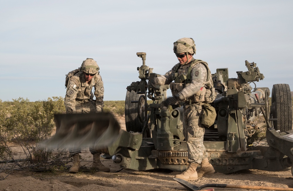 Soldiers rapidly engage enemies with M777 howitzer