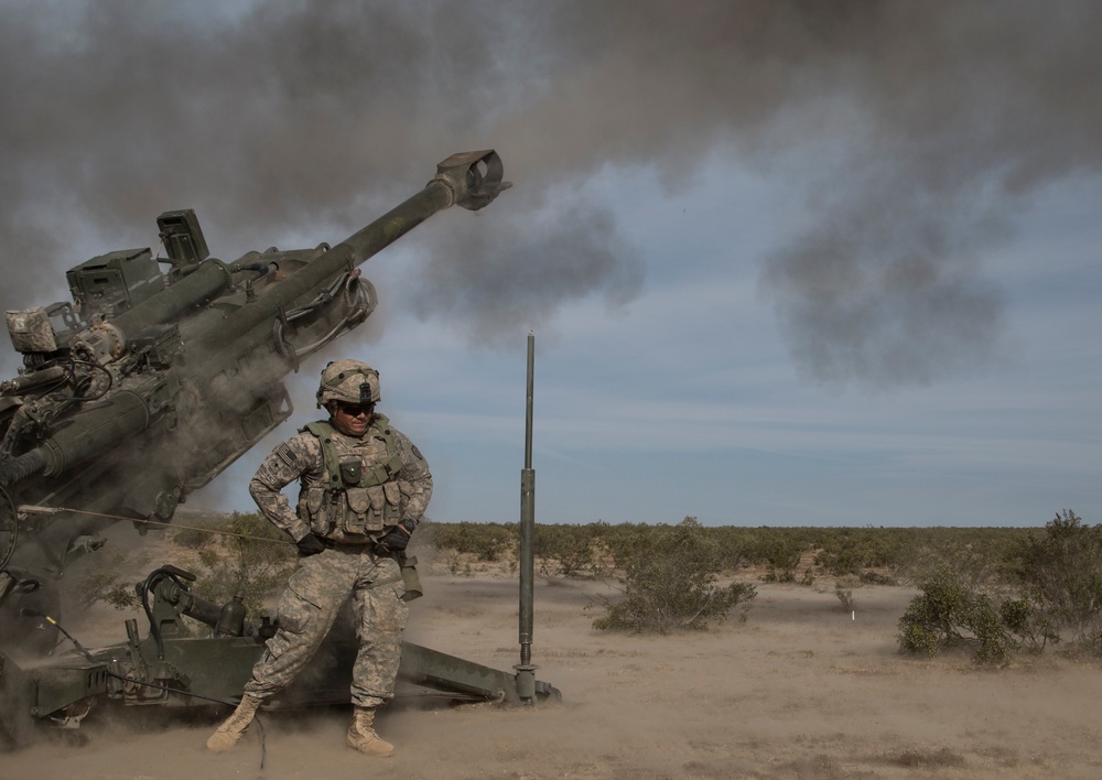 Soldiers rapidly engage enemies with M777 howitzer