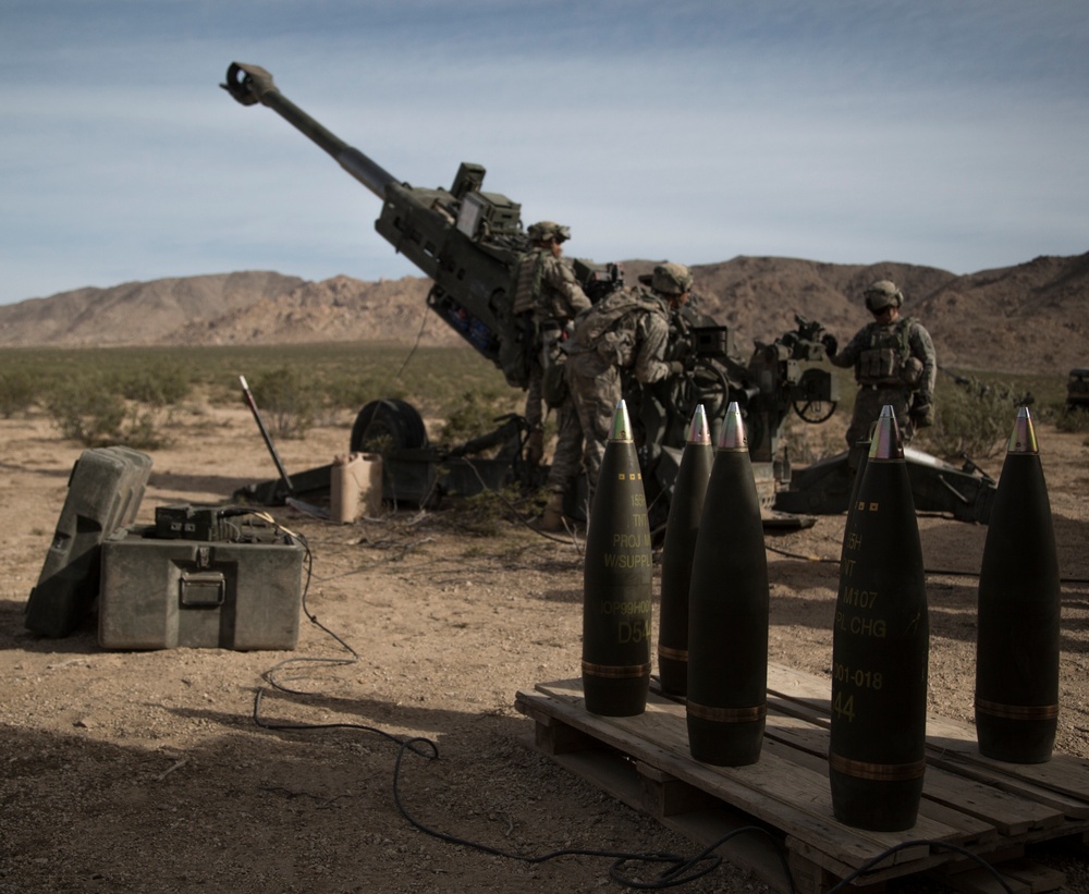 Soldiers rapidly engage enemies with M777 howitzer