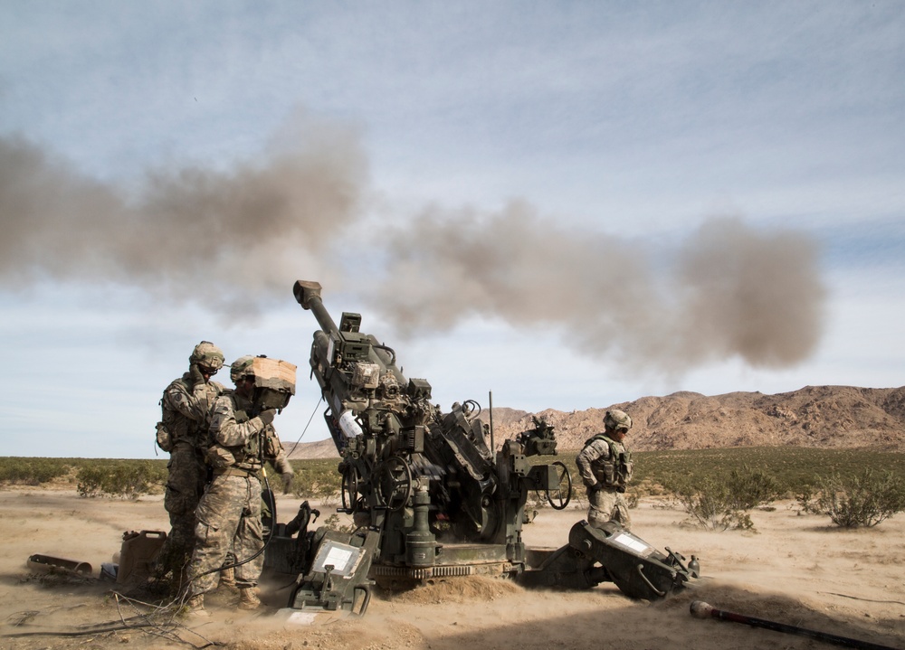Soldiers rapidly engage enemies with M777 howitzer