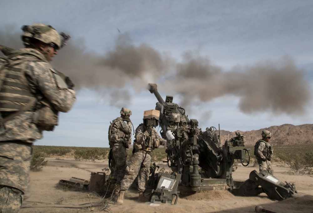 Soldiers rapidly engage enemies with M777 howitzer