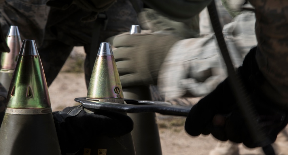 Soldiers rapidly engage enemies with M777 howitzer