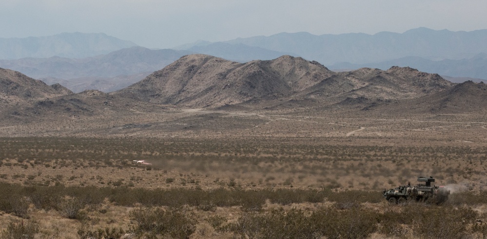 Soldiers engage enemy targets with a Tube-launched, Optically-tracked, Wire-guided 2B Aero Missile