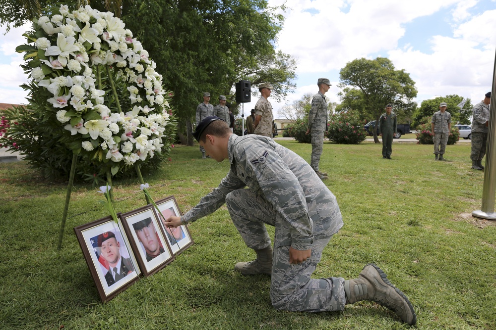 U.S. Marines and U.S. Airmen conduct a Memorial Day ceremony on Moron Air Base, Spain