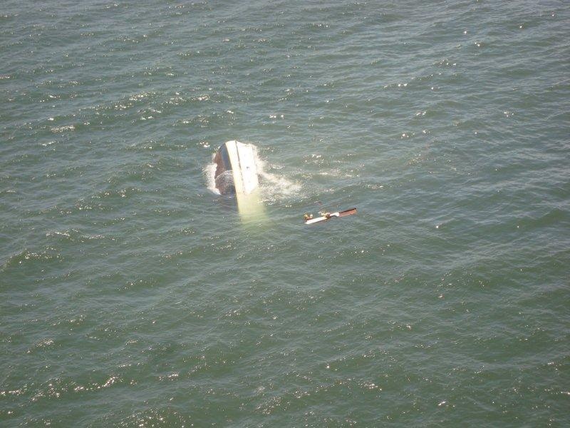 Coast Guard monitoring salvage of sunken fishing boat