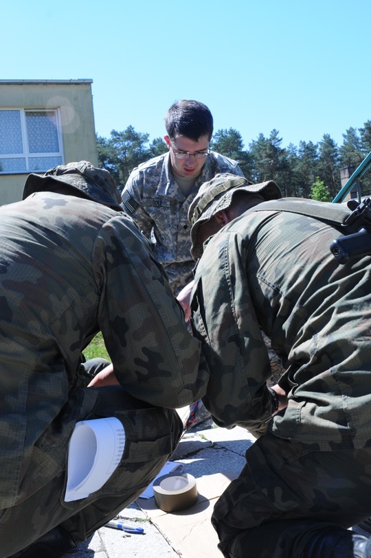 Allied nations break barriers and doors during breach training