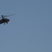 AH-6E Apache helicopter provides security